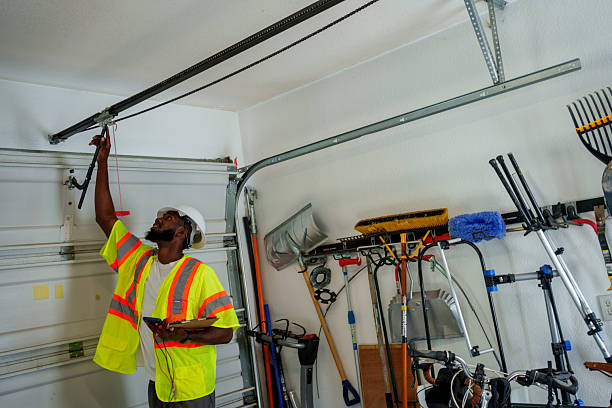 Professional Garage Door Roller Replacement technician working in Evans County County, GA